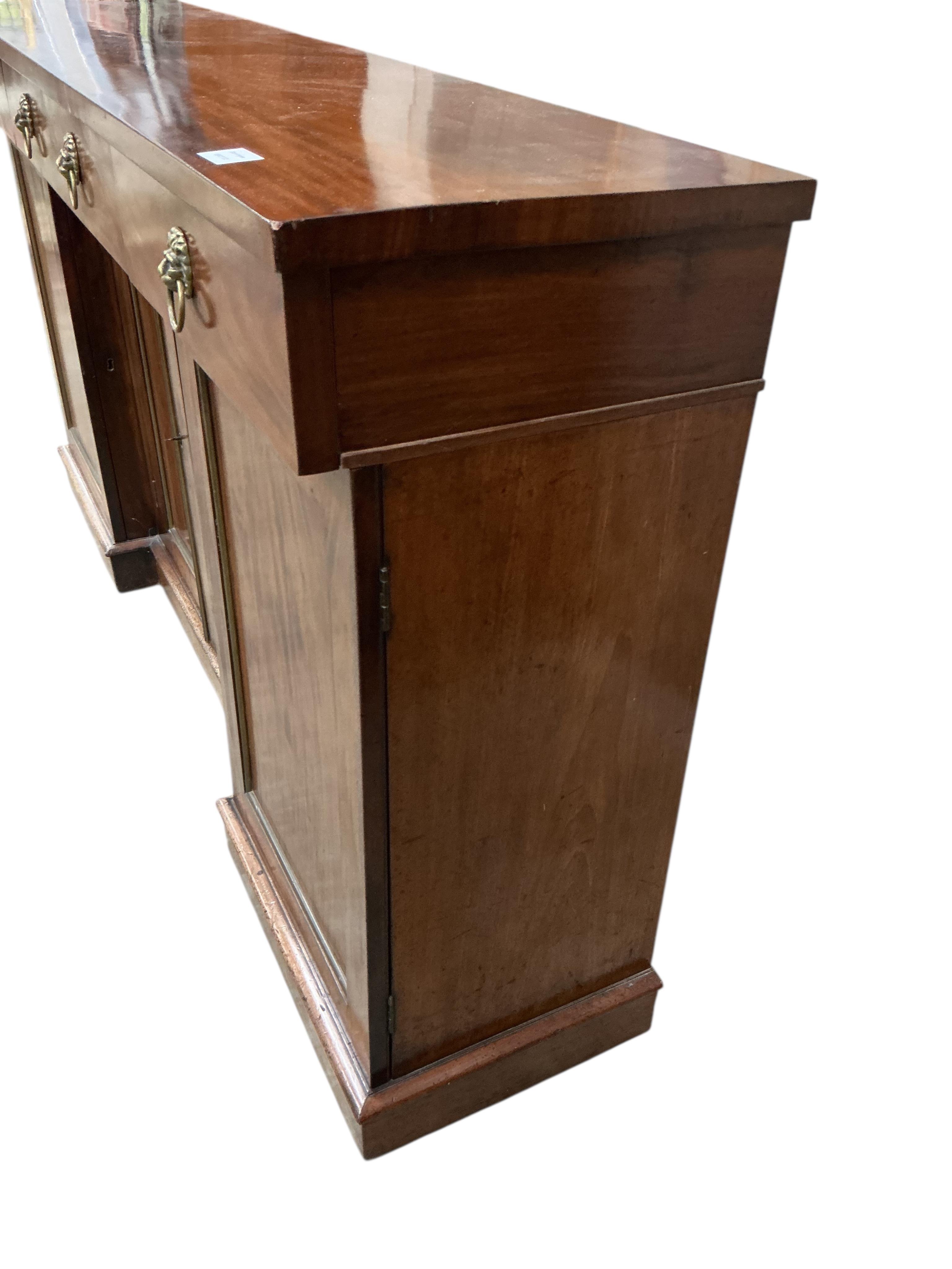 A George IV mahogany inverse breakfront sideboard, width 168cm, depth 38cm, height 92cm